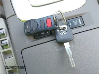 2005 Infiniti G35 z VIN JNKCV51F65M315544, wystawiony jako IAAI lot #41909006 z przebiegiem 142 000 mil mil oraz . Historia ofert i sprzedaży dostępna na DreamBid. Obrazek 11.