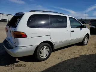 1999 Toyota Sienna LE with VIN 4T3ZF13C0XU144476, listed as a Copart auction lot 48185235 with 183,940 mi miles and Salvage title. Bid and sale history available at DreamBid. Image 3.