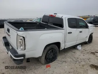 2022 GMC Canyon 4WD AT4 w/Cloth with VIN 1GTG6FEN8N1136558, listed as a Copart auction lot 82026324 with 68,281 mi miles and Salvage Title. Bid and sale history available at carsss.com. Image 3.