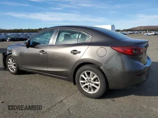 2015 Mazda 3 i Touring with VIN 3MZBM1V71FM139968, listed as a Copart auction lot 87299184 with Not provided miles and Salvage title. Bid and sale history available at DreamBid. Image 2.