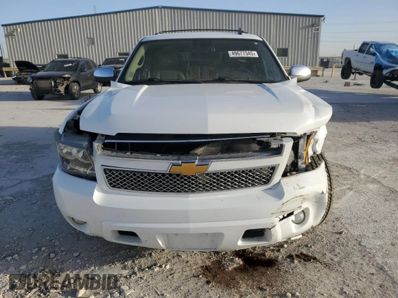 2013 Chevrolet Tahoe LTZ with VIN 1GNSCCE08DR102648, listed as a Copart auction lot 49677345 with 226,528 mi miles and Salvage title. Bid and sale history available at DreamBid. Image 5.