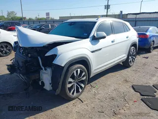 2022 Volkswagen Atlas SEL Premium R-Line with VIN 1V2FE2CA6NC220596, listed as a IAAI auction lot 41864407 with 13,120 mi miles and . Bid and sale history available at DreamBid. Image 2.