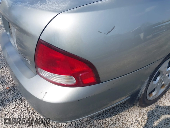 2003 Nissan Sentra XE with VIN 3N1CB51D23L793012, listed as a IAAI auction lot 42144509 with 86,104 mi miles and . Bid and sale history available at DreamBid. Image 12.