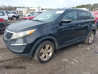 2012 Kia Sportage LX with VIN KNDPB3A23C7203826, listed as a IAAI auction lot 41464022 with 260,980 mi miles. Bid and sale history available at carsss.com. Image 2.
