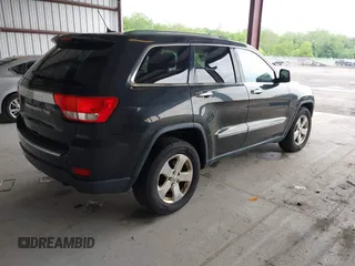 2012 Jeep Grand Cherokee Limited z VIN 1C4RJFBT1CC312006, wystawiony jako IAAI lot #42247170 z przebiegiem 233 890 mil mil oraz . Historia ofert i sprzedaży dostępna na DreamBid. Obrazek 4.