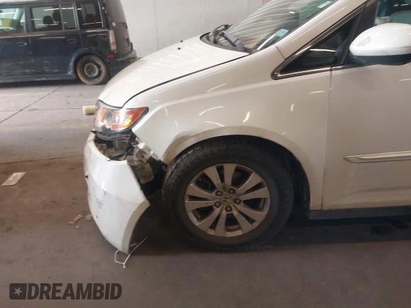2014 Honda Odyssey EX-L with VIN 5FNRL5H60EB030841, listed as a IAAI auction lot 42271401 with 107,343 mi miles and . Bid and sale history available at DreamBid. Image 6.