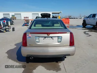 2005 Cadillac STS z VIN 1G6DC67A950171835, wystawiony jako IAAI lot #41599105 z przebiegiem 74 235 mil mil oraz . Historia ofert i sprzedaży dostępna na DreamBid. Obrazek 16.