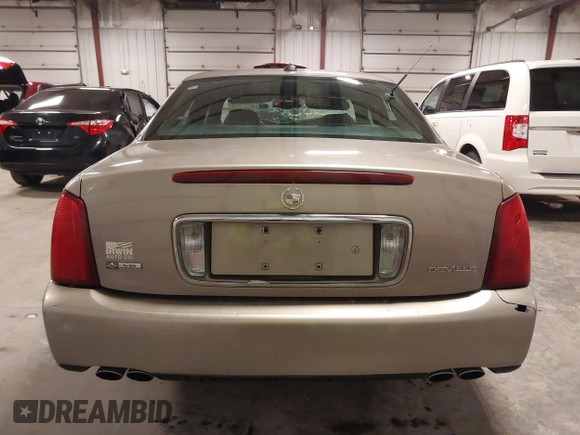 2004 Cadillac DeVille z VIN 1G6KD54Y04U119341, wystawiony jako IAAI lot #42193664 z przebiegiem 162 290 mil mil oraz . Historia ofert i sprzedaży dostępna na DreamBid. Obrazek 17.
