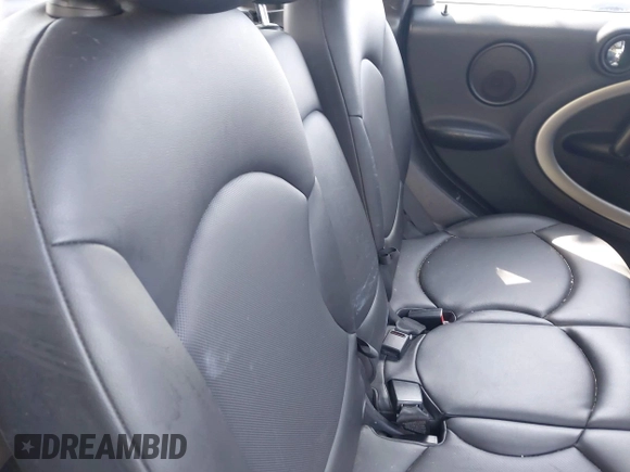 2014 MINI Countryman with VIN WMWZB3C59EWR37439, listed as a IAAI auction lot 42110149 with 181,661 mi miles and . Bid and sale history available at DreamBid. Image 8.