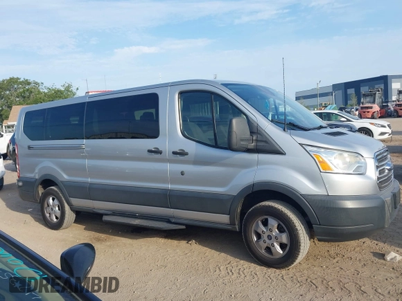 2018 Ford Transit Passenger XL with VIN 1FBZX2YM0JKA70128, listed as a IAAI auction lot 42379000 with 125,309 mi miles and . Bid and sale history available at DreamBid. Image 13.