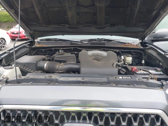 2018 Toyota Tacoma SR5 with VIN 3TMAZ5CN1JM071396, listed as a IAAI auction lot 42061640 with 122,148 mi miles and . Bid and sale history available at DreamBid. Image 10.
