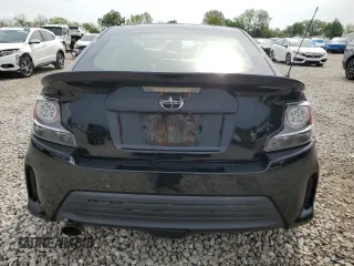 2014 Scion tC z VIN JTKJF5C76E3070903, wystawiony jako Copart lot #54953665 z przebiegiem 77 850 mil mil oraz Szkody całkowita. Historia ofert i sprzedaży dostępna na DreamBid. Obrazek 6.