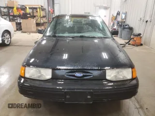 1995 Ford Escort z VIN 1FASP11J8SW175507, wystawiony jako Copart lot #42561915 z przebiegiem 153 495 mil mil oraz Czysty tytuł • Clean title. Historia ofert i sprzedaży dostępna na DreamBid. Obrazek 5.