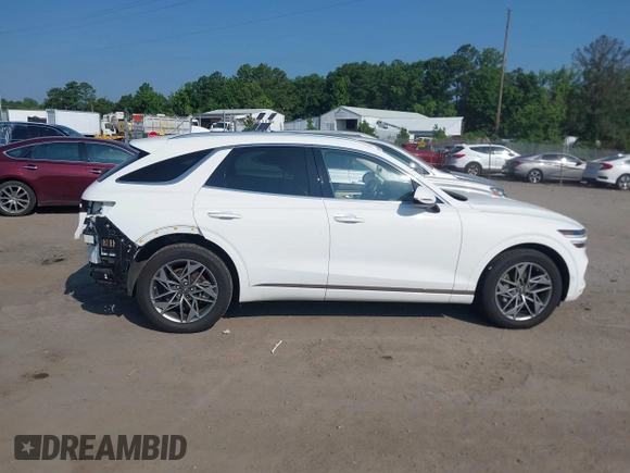 2023 Genesis GV70 2.5T with VIN KMUMADTB6PU096929, listed as a IAAI auction lot 42554427 with 73,553 mi miles and . Bid and sale history available at DreamBid. Image 13.