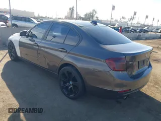 2014 BMW 3 Series 328i with VIN WBA3A5C56EP603819, listed as a IAAI auction lot 41217764 with 156,140 mi miles and . Bid and sale history available at carsss.com. Image 3.