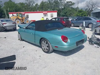 2003 Ford Thunderbird Deluxe z VIN 1FAHP60A33Y110451, wystawiony jako IAAI lot #42133863 z przebiegiem Nie podano mil oraz . Historia ofert i sprzedaży dostępna na DreamBid. Obrazek 3.