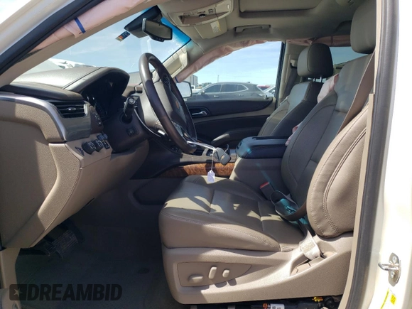 2015 Chevrolet Suburban LTZ with VIN 1GNSKKKC1FR659707, listed as a Copart auction lot 50202895 with 91,680 mi miles and Salvage Title. Bid and sale history available at DreamBid. Image 7.