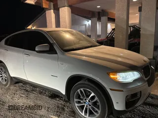 2014 BMW X6 xDrive35i with VIN 5UXFG2C58E0H09681, listed as a Copart auction lot 83922494 with 120,170 mi miles and Salvage Title. Bid and sale history available at carsss.com. Image 1.