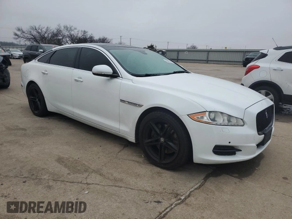 2013 Jaguar XJ with VIN SAJWA2G1XDLV55349, listed as a Copart auction lot 86587444 with 160,513 mi miles and Clean Title. Bid and sale history available at carsss.com. Image 4.