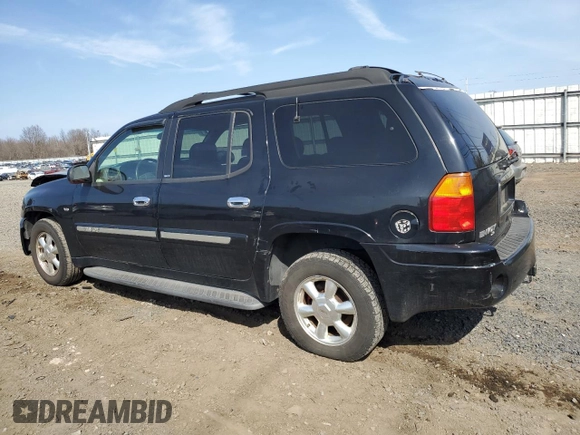 2003 GMC Envoy SLT z VIN 1GKET16PX36243554, wystawiony jako Copart lot #49083975 z przebiegiem 148 596 mil mil oraz Szkoda całkowita • Salvage title. Historia ofert i sprzedaży dostępna na DreamBid. Obrazek 2.