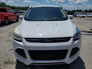 2014 Ford Escape SE z VIN 1FMCU9GX6EUA86354, wystawiony jako Copart lot #63978135 z przebiegiem 178 107 mil mil oraz Czysty tytuł • Clean title. Historia ofert i sprzedaży dostępna na DreamBid. Obrazek 5.