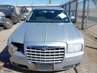 2006 Chrysler 300 Touring with VIN 2C3KA53G86H111027, listed as a IAAI auction lot 41870312 with 59,870 mi miles. Bid and sale history available at carsss.com. Image 11.