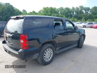 2010 Chevrolet Tahoe LS with VIN 1GNMCAE00AR175361, listed as a IAAI auction lot 42573822 with 188,700 mi miles and . Bid and sale history available at DreamBid. Image 4.