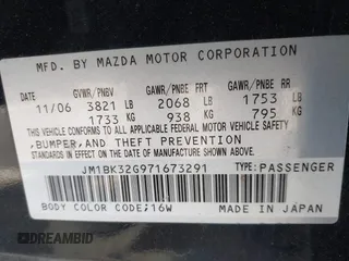 2007 Mazda 3 i Touring with VIN JM1BK32G971673291, listed as a IAAI auction lot 41916235 with 97,391 mi miles and . Bid and sale history available at DreamBid. Image 9.