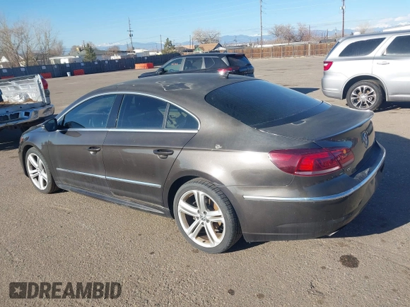 2014 Volkswagen CC Sport with VIN WVWBP7AN7EE514221, listed as a IAAI auction lot 41528930 with 140,227 mi miles and . Bid and sale history available at DreamBid. Image 3.