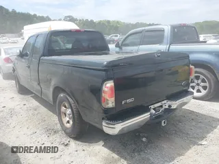 2000 Ford F-150 XL with VIN 1FTZX1723YNB84512, listed as a IAAI auction lot 41966003 with 1 mi miles. Bid and sale history available at carsss.com. Image 3.
