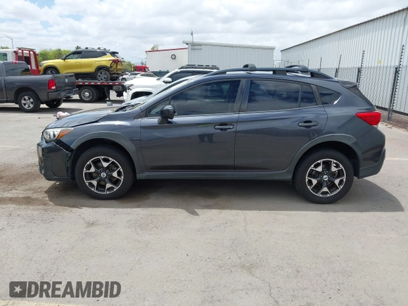 2018 Subaru Crosstrek Premium z VIN JF2GTACC9JH215303, wystawiony jako IAAI lot #42228185 z przebiegiem 71 170 mil mil oraz . Historia ofert i sprzedaży dostępna na DreamBid. Obrazek 14.