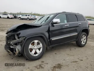 2013 Jeep Grand Cherokee Limited with VIN 1C4RJEBG5DC657005, listed as a Copart auction lot 84101024 with 124,055 mi miles and Salvage Title. Bid and sale history available at carsss.com. Image 1.