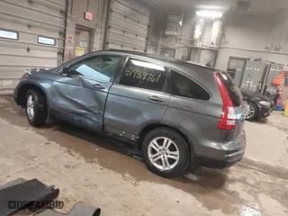 2010 Honda CR-V EX-L with VIN 5J6RE4H79AL052139, listed as a IAAI auction lot 41939761 with 130,665 mi miles. Bid and sale history available at carsss.com. Image 3.