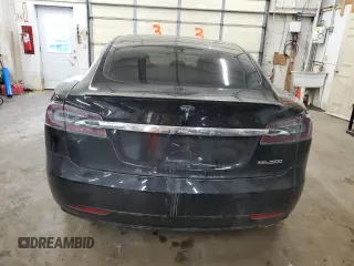 2019 Tesla Model S 100D с VIN 5YJSA1E46KF332553, выставлен на аукционе Copart как лот 41532825 с пробегом 131 073 миль миль и Списание • Salvage title. История ставок и продаж доступна на DreamBid. Изображение 6.
