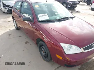 2007 Ford Focus S z VIN 1FAFP31N27W231884, wystawiony jako IAAI lot #41138534 z przebiegiem 84 506 mil mil oraz . Historia ofert i sprzedaży dostępna na DreamBid. Obrazek 6.
