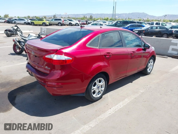 2015 Ford Fiesta SE with VIN 3FADP4BJ4FM149307, listed as a IAAI auction lot 42078091 with 124,529 mi miles. Bid and sale history available at carsss.com. Image 4.