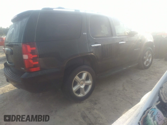 2008 Chevrolet Tahoe LTZ with VIN 1GNFK13028J123429, listed as a IAAI auction lot 42415046 with 240,925 mi miles and . Bid and sale history available at DreamBid. Image 4.