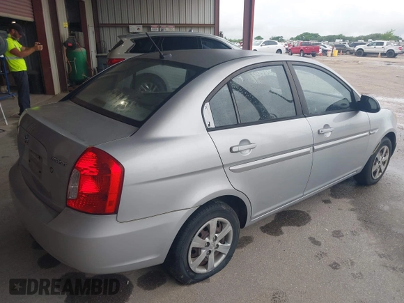 2009 Hyundai Accent Auto GLS with VIN KMHCN46C99U349778, listed as a IAAI auction lot 41871523 with 140,012 mi miles. Bid and sale history available at carsss.com. Image 4.