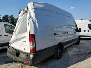 2021 Ford Transit Cargo with VIN 1FTBW3X83MKA40734, listed as a Copart auction lot 77427214 with Not Provided miles and Salvage Title. Bid and sale history available at carsss.com. Image 3.
