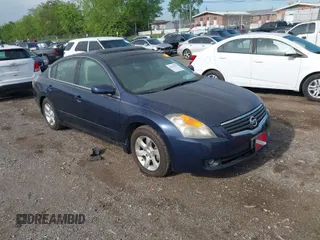 2009 Nissan Altima 2.5 S with VIN 1N4AL21E79C126309, listed as a IAAI auction lot 42095416 with 127,254 mi miles. Bid and sale history available at carsss.com. Image 1.