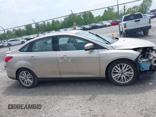 2018 Ford Focus Titanium с VIN 1FADP3J27JL279628, выставлен на аукционе IAAI как лот 42139356 с пробегом 108 007 миль миль и . История ставок и продаж доступна на DreamBid. Изображение 14.