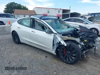 2023 Tesla Model 3 Performance with VIN 5YJ3E1EC8PF585171, listed as a IAAI auction lot 40007517 with Not Provided miles. Bid and sale history available at carsss.com. Image 1.