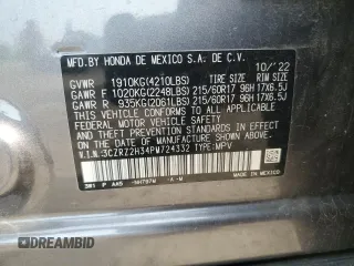 2023 Honda HR-V LX with VIN 3CZRZ2H34PM724332, listed as a Copart auction lot 59351165 with 20,700 mi miles and Salvage title. Bid and sale history available at DreamBid. Image 14.