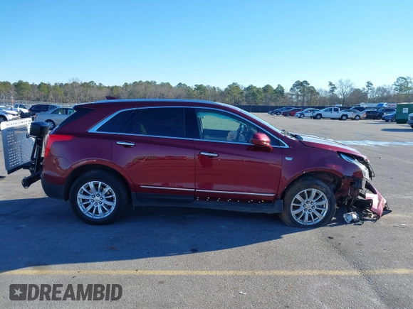 2018 Cadillac XT5 FWD with VIN 1GYKNARS4JZ211455, listed as a IAAI auction lot 41257536 with 102,032 mi miles and . Bid and sale history available at DreamBid. Image 12.