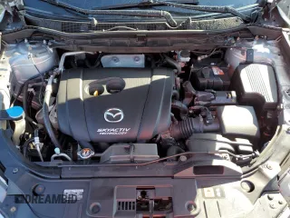 2014 Mazda CX-5 Touring with VIN JM3KE2CY8E0305641, listed as a Copart auction lot 42617165 with 107,336 mi miles and Salvage Title. Bid and sale history available at carsss.com. Image 12.