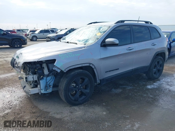 2021 Jeep Cherokee Altitude with VIN 1C4PJLLB6MD112830, listed as a IAAI auction lot 41560135 with 76,760 mi miles. Bid and sale history available at carsss.com. Image 18.