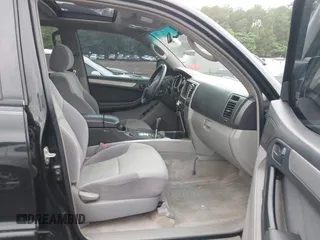 2004 Toyota 4Runner SR5 with VIN JTEBU14R348011721, listed as a IAAI auction lot 42266523 with 295,016 mi miles and . Bid and sale history available at DreamBid. Image 5.