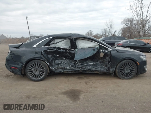 2017 Lincoln MKZ Reserve z VIN 3LN6L5E9XHR649804, wystawiony jako IAAI lot #41906488 z przebiegiem 161 150 mil mil oraz . Historia ofert i sprzedaży dostępna na DreamBid. Obrazek 13.