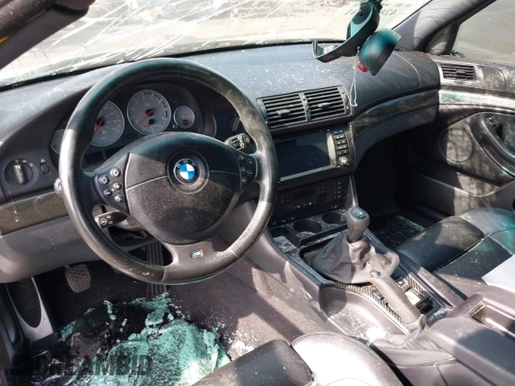 2000 BMW M5 z VIN WBSDE9349YBZ96946, wystawiony jako IAAI lot #42043141 z przebiegiem 107 000 mil mil oraz . Historia ofert i sprzedaży dostępna na DreamBid. Obrazek 16.