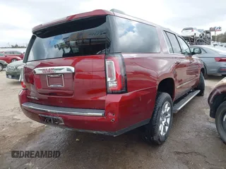 2016 GMC Yukon XL Denali with VIN 1GKS1HKJXGR453840, listed as a IAAI auction lot 41057135 with 105,469 mi miles. Bid and sale history available at carsss.com. Image 4.